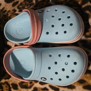 Blue and pink crocs